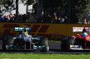 Nico Rosberg holds off Fernando Alonso in to turn three