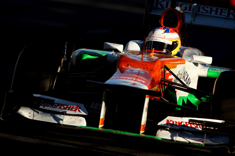 Paul di Resta contends with the setting sun at Albert Park
