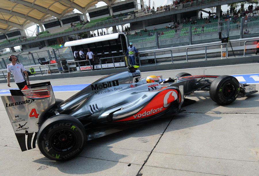 Lewis Hamilton heads out of the McLaren garage