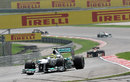 Nico Rosberg tackles turn four as the circuit gets busy