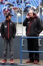 Virgin Racing's Lucas di Grassi and John Booth in the pits