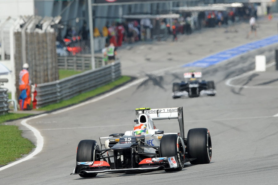 Sergio Perez leaves the pit lane