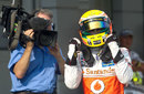 Lewis Hamilton celebrates his pole position