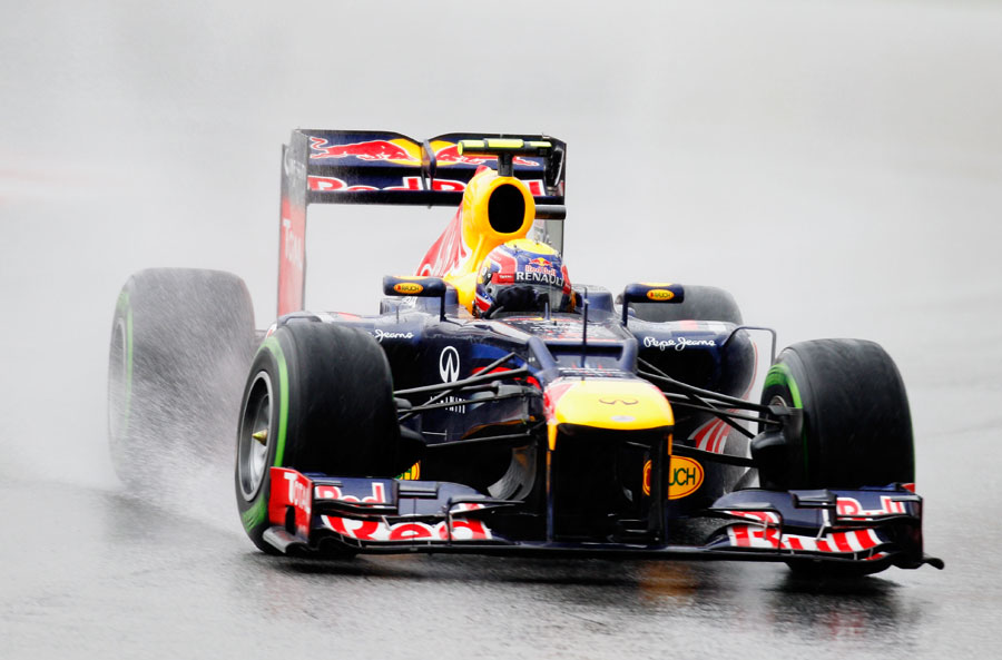 Mark Webber looks for grip on the intermediate tyres