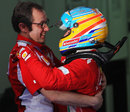 Stefano Domenicali congratulates Fernando Alonso after the race