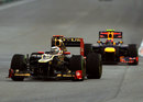 Kimi Raikkonen leads Mark Webber on a drying track