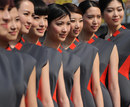 Chinese models pose during a launch show for the 2012 Chinese Grand Prix