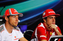 Jenson Button and Fernando Alonso respond to questions in the press conference