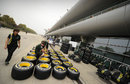 Caterham team members at work on the team's allocation of Pirelli tyres