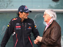 Mark Webber and Bernie Ecclestone chat in the paddock