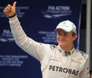 Nico Rosberg acknowledges the crowd after scoring his first pole position in F1