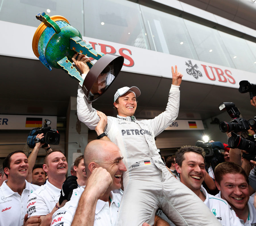 Nico Rosberg celebrates his first F1 victory with his team