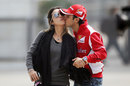 Felipe Massa kisses his wife Rafaela before departing for FP3