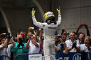 Nico Rosberg celebrates his first F1 victory with his team