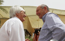 Bernie Ecclestone and Ron Dennis share a joke in the paddock
