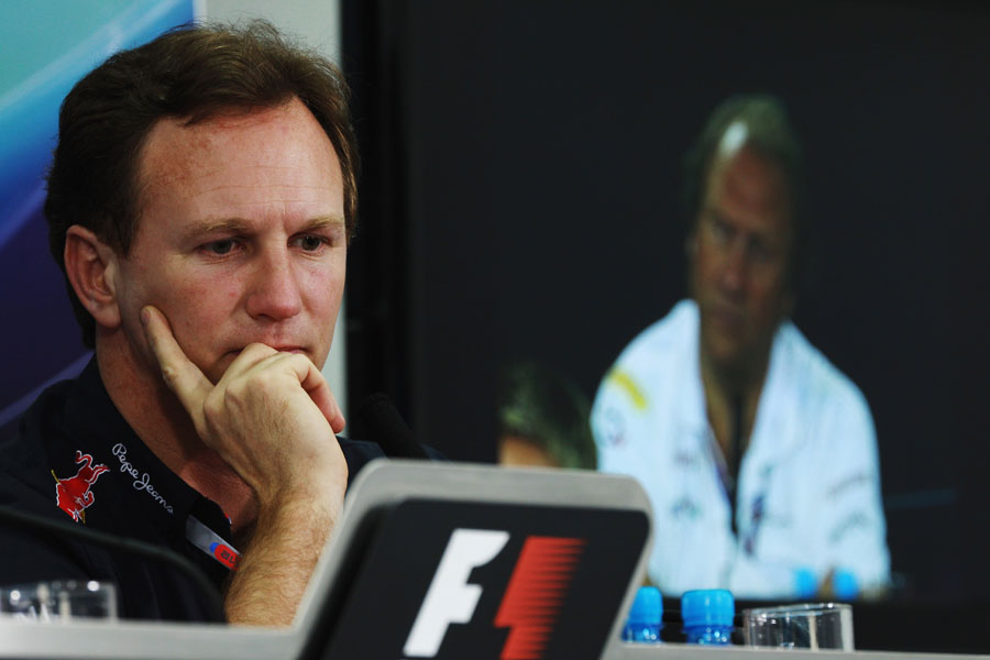 Christian Horner looks concerned during the FIA press conference