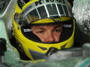 Nico Rosberg waits in his car ahead of his next run