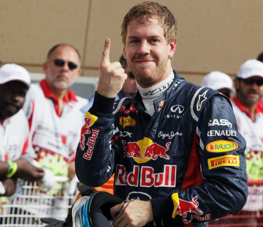 Sebastian Vettel celebrates his first pole position of the season