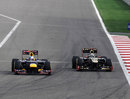 Kimi Raikkonen attempts to pass Sebastian Vettel around the outside of turn one