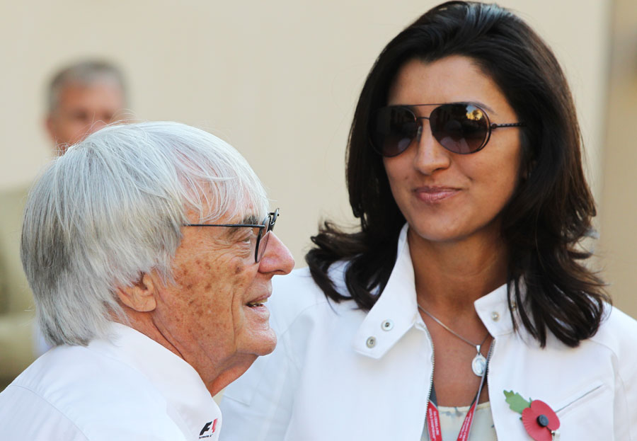 Bernie Ecclestone in the paddock with girlfriend Fabiani Flosi