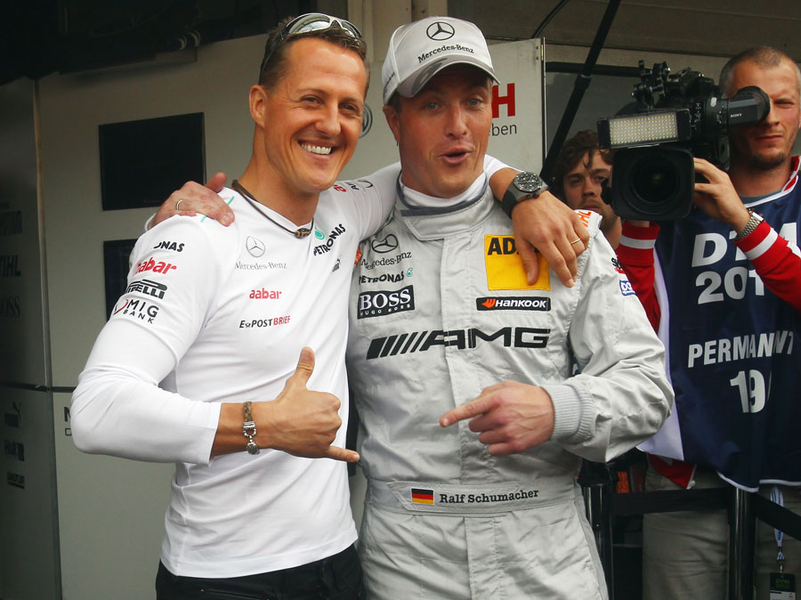 Michael Schumacher joins his brother Ralf in the DTM pitlane