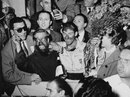 Stirling Moss and Denis Jenkinson celebrate winning the Mille Miglia