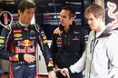 Mark Webber and Sebastian Vettel discuss the RB8 in the Red Bull garage