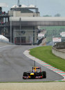 Mark Webber attacks turn one in damp conditions