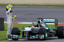 Nico Rosberg signals for help after stopping on track
