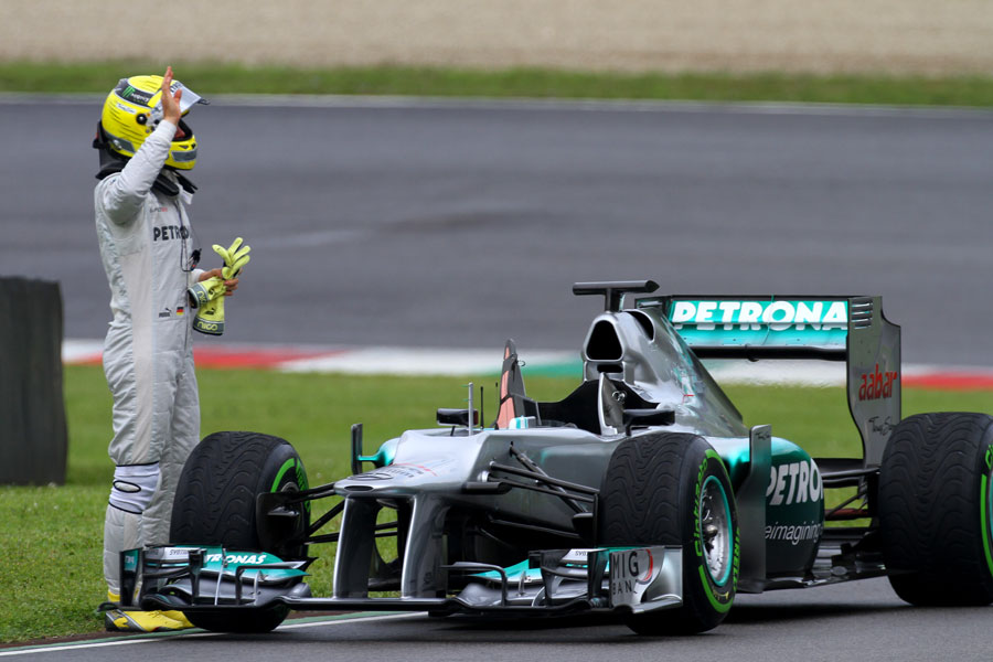 Nico Rosberg signals for help after stopping on track