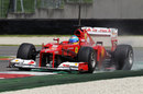Fernando Alonso runs wide as he attacks the circuit