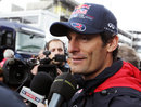 Mark Webber talks to the press