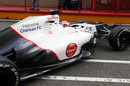 Kamui Kobayashi leaves the Sauber garage in the updated C31
