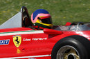 The distinctive helmet of Jacques Villeneuve in the 312 T4 that his father Gilles used to drive