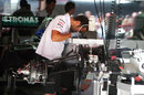 A Mercedes mechanic at work in the garage