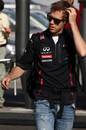 Sebastian Vettel arrives at the circuit on Saturday morning