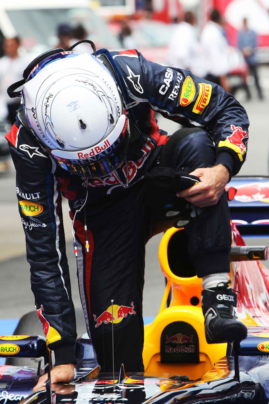Sebastian Vettel climbs from his RB8 after qualifying