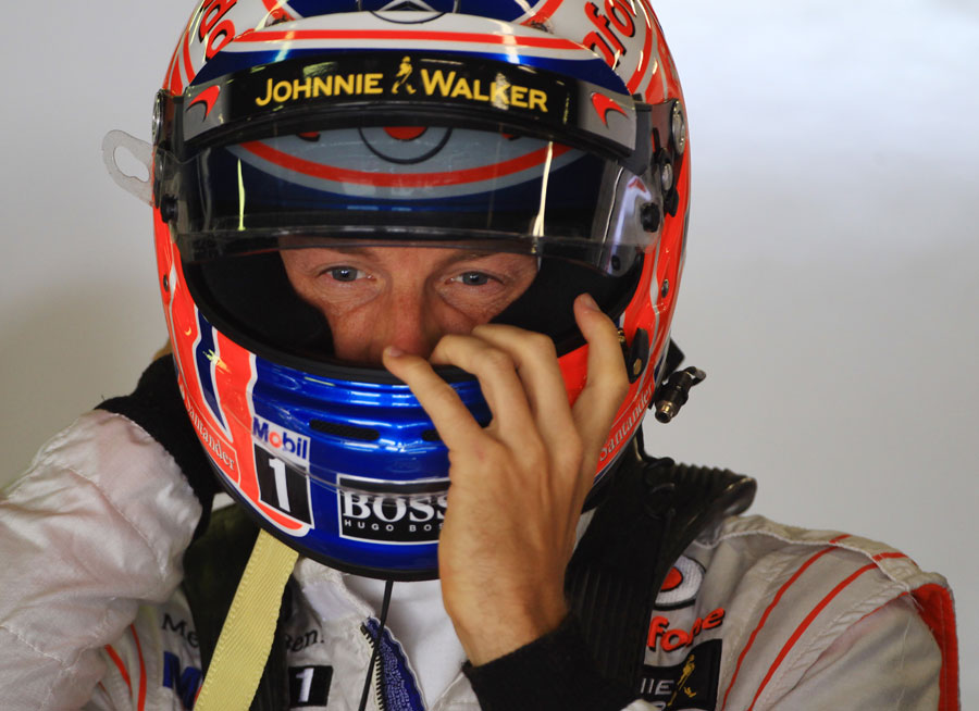 Jenson Button gets ready for qualifying