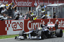 Pastor Maldonado crosses the line for his maiden win