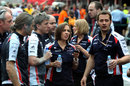 Concerned Williams team members in the pit lane