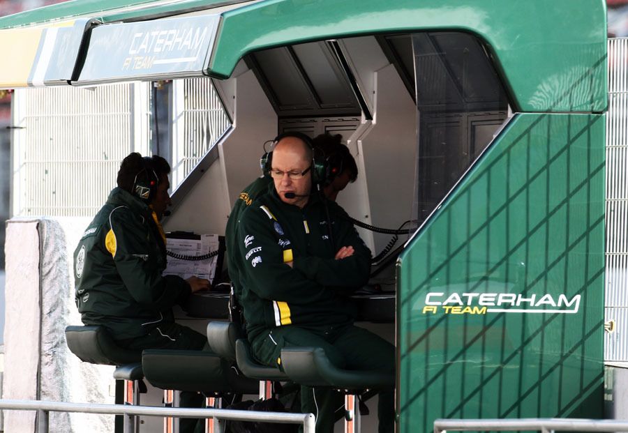 Mark Smith deep in thought on the Caterham pit wall