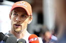 Jenson Button talks to the press on Wednesday