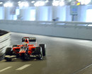 Timo Glock speeds through the tunnel