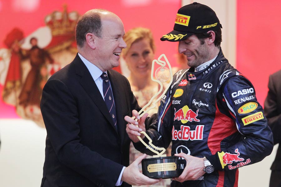 HRH Prince Albert of Monaco presents the winners' trophy to Mark Webber
