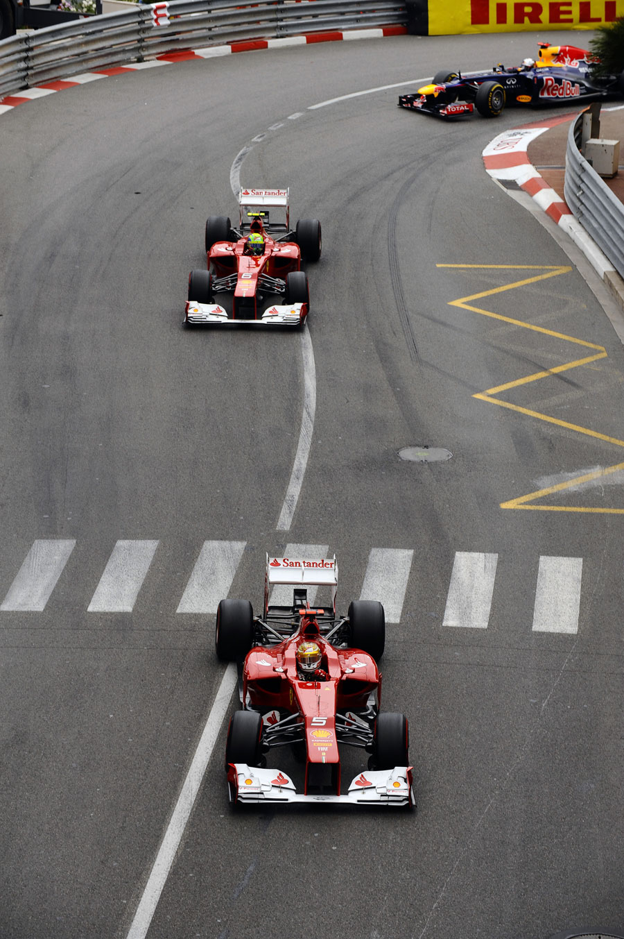 Fernando Alonso leads Felipe Massa and Sebastian Vettel