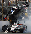 Will Power drives under an airborne Mike Conway after they made contact at the Indy 500