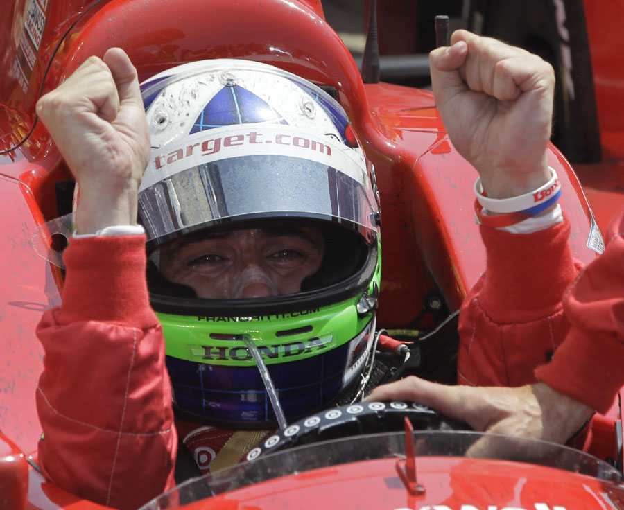 Dario Franchitti celebrates winning his third Indy 500 crown 