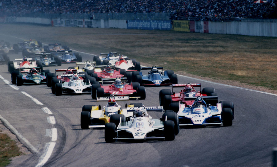 Alan Jones leads at the start of the race