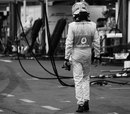 Jenson Button trudges back to the pits after his retirement
