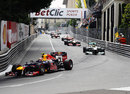 Mark Webber leads the pack under the safety car